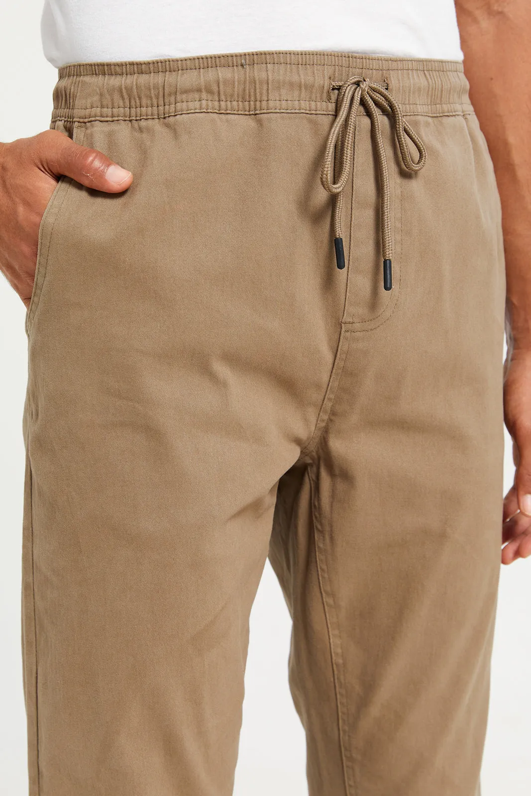 Men Beige Slim Fit Pull On Trousers